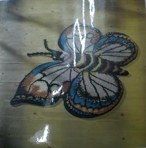 tapis point noué papillon
